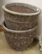 A pair of glazed earthenware planters W.51cm