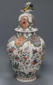 A 19th century tin glazed jar and cover height 48cm