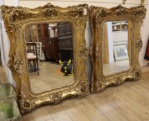 A pair of Victorian style gilt mirrors W.103cm