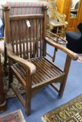 An Arts & Crafts style oak elbow chair