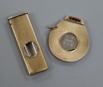 Two engine turned 9ct. gold mounted cigar cutters.