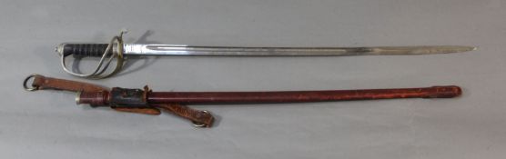 A George VI Royal Artillery dress sword and leather covered scabbard, the etched blade by