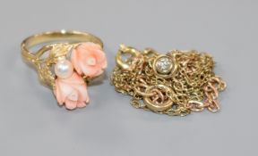 A 14k gold, carved coral and cultured pearl set dress ring, a diamond set pendant necklace and a