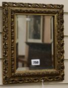 A small gilt carved wood and gesso rectangular wall mirror W.26cm