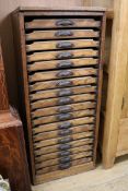 A late Victorian pitch pine multiple drawer collectors' chest W.47cm