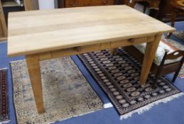 A pine two drawer farmhouse table W.152cm