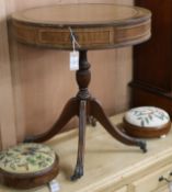 A mahogany reproduction drum table W.59cm