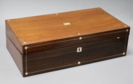 A Victorian rosewood writing box with mother of pearl inlay