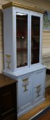A painted bookcase W.95cm