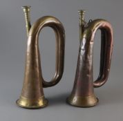 A WWI Boosey & Co. military bugle and a WWII Hy. Keat & Sons military bugle, dated 1914 & 1940,