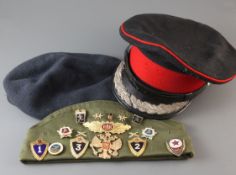 A Soviet post war era beret, an RAF beret, a post war officer's cap