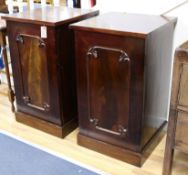 A pair of mahogany bedside cabinets W.47cm