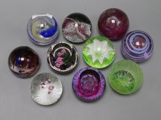 Ten paperweights including Caithness