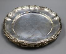 A set of four Peruvian 925 white metal petal rimmed dishes, diameter 28cm, 51 oz.