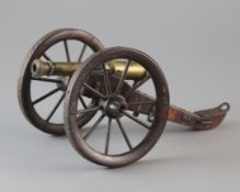 The Kevin Morris collection lots 1-86. A 19th century model of an artillery field gun with wrought