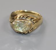 A 19th century yellow metal and foil backed rose cut diamond dress ring, size L.