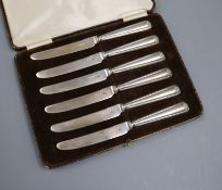 A set of six George V silver tea knives with silver blades, Sheffield, 1933.
