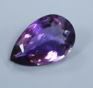 An unmounted pear cut amethyst, weighing approximately sixty five carats.