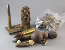 A group of shell and grenade artefacts, including a 19th century grapeshot cluster, a 1905 German