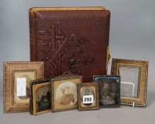 A collection of mixed ambrotypes and a leather photo album