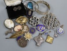 A collection of silver jewellery etc. including buckle, bangle and cameo.