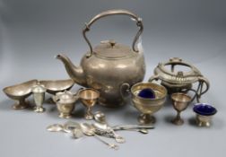 A silver 4 piece condiment set, minor silver flatware, a silver cup (af) and six items of plated