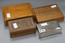 A plated box and three wooden boxes
