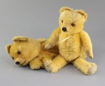 An Omega Pyjama case 1930's, Merrythought bear 1940's, tallest 14in.