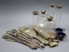 A mixed quantity of silver items including toilet jars, shoe horns, button hooks and two silver