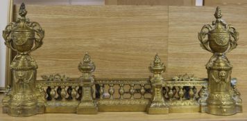 A French gilt metal extending fire curb