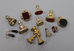 Ten assorted early 20th century and later fob seals, including 9ct and gem set, together with a pair