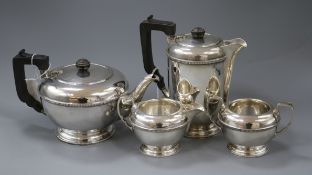 A silver four-piece tea service, Sheffield 1955, makers Harrison Bros & Howson, gross 46.5oz.