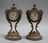 A pair of French bronze timepieces Height 23cm