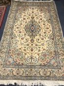 A Kashan rug 235 x 147cm
