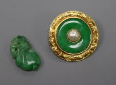 A 14k gold mounted jadeite and cultured pearl circular brooch and a 19th century jadeite carving,