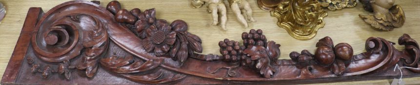 A pair of carved wood panels Length 108cm