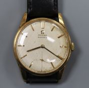 A gentleman's 1960's 9ct gold Omega manual wind wrist watch, movement c.269, retailed by Asprey,