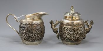 Two items of Burmese 900 silver by Paung, comprising a sucrier and cover of barrel form with