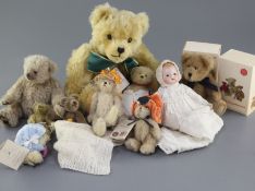 A Herman collector's bear, three Herman miniatures, a miniature Steiff, a Deb Canham miniature,