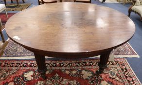 A mid Victorian mahogany circular topped dining table Diameter 153cm (adapted)