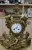 A French gilt bronze and porcelain mantel clock Height 43cm