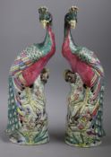 A pair of Chinese famille rose models of peacocks, 19th century Height 32cm