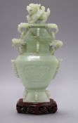 A Chinese bowenite jade vase, cover and stand in box