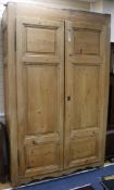 A large 19th century French pine two door Armoire W.140cm