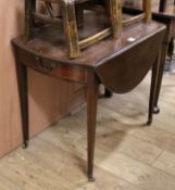 A George III inlaid mahogany oval topped Pembroke table W.88cm