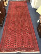 A Baluchi rug 280 x 103cm