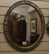 An oval Irish mirror W.47cm