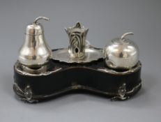 A Victorian novelty silver mounted ebonised kidney shaped inkstand, modelled as an apple & pear