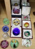 Fourteen glass paperweights including Caithness and Whitefriars