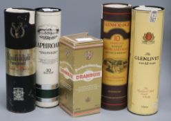 Four bottles of whisky - Laphroaig, Glenlivot, Glenfiddich, Glenmorangie and one bottle of Drambuie